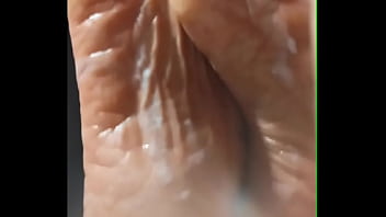 Bitchs feet soaked in cum